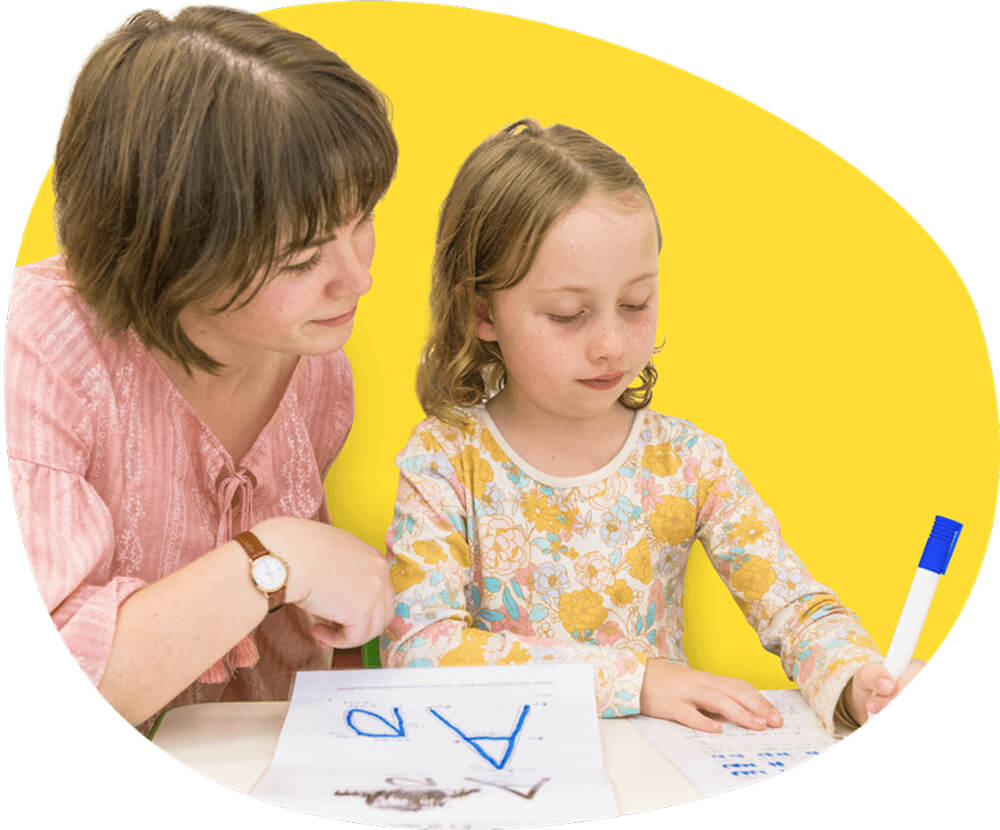 A mother and child drawing together